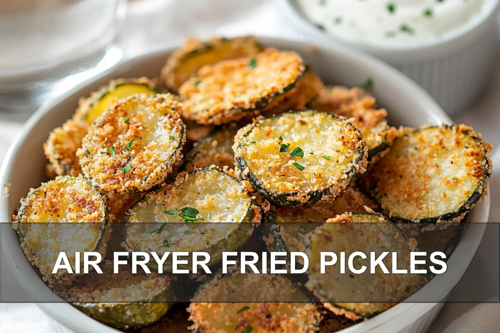 AIR FRYER FRIED PICKLES crisp golden pickles plated on white napkin with glass of water