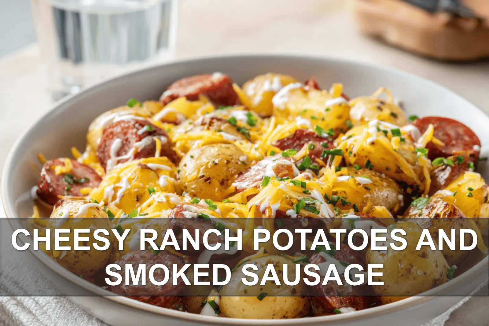 Cheesy Ranch Potatoes and Smoked Sausage: Easy and Delicious 2 CHEESY RANCH POTATOES AND SMOKED SAUSAGE golden baked skillet with melted cheddar and fresh herbs