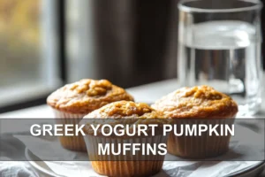 GREEK YOGURT PUMPKIN MUFFINS fresh baked muffins on white napkin with clear water glass