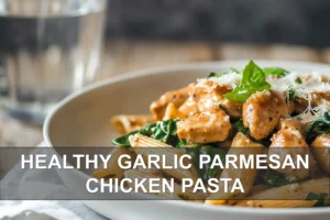 Healthy Garlic Parmesan Chicken Pasta: Easy and Delicious HEALTHY GARLIC PARMESAN CHICKEN PASTA plated whole wheat penne with spinach and herbs