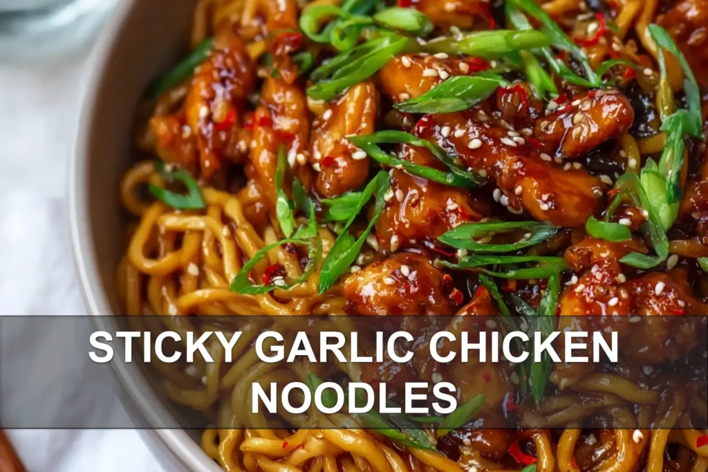 STICKY GARLIC CHICKEN NOODLES glossy egg noodles with caramelized chicken and sesame seeds