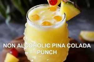 How to Make the Best Non Alcoholic Piña Colada Punch NON ALCOHOLIC PINA COLADA PUNCH centered hero view, clean and uncluttered
